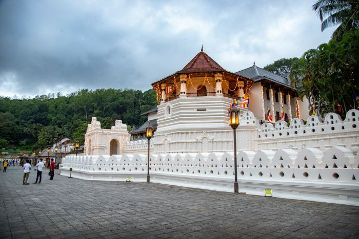 Temple of the Sacred Tooth Relic in Kandy with devotees