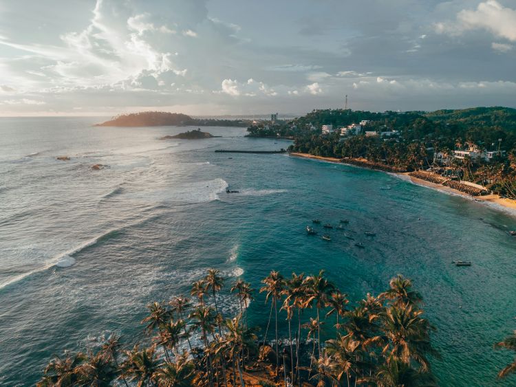 Mirissa Beach with golden sand and calm sea
