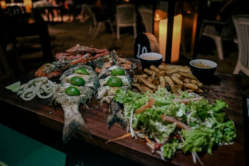 Seafood restaurant on Mirissa Beach at night