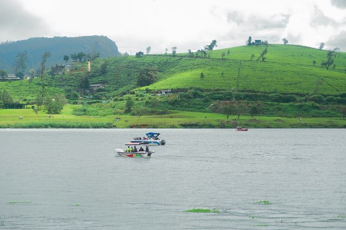 Gregory Lake in Nuwara Eliya with boats and mountains